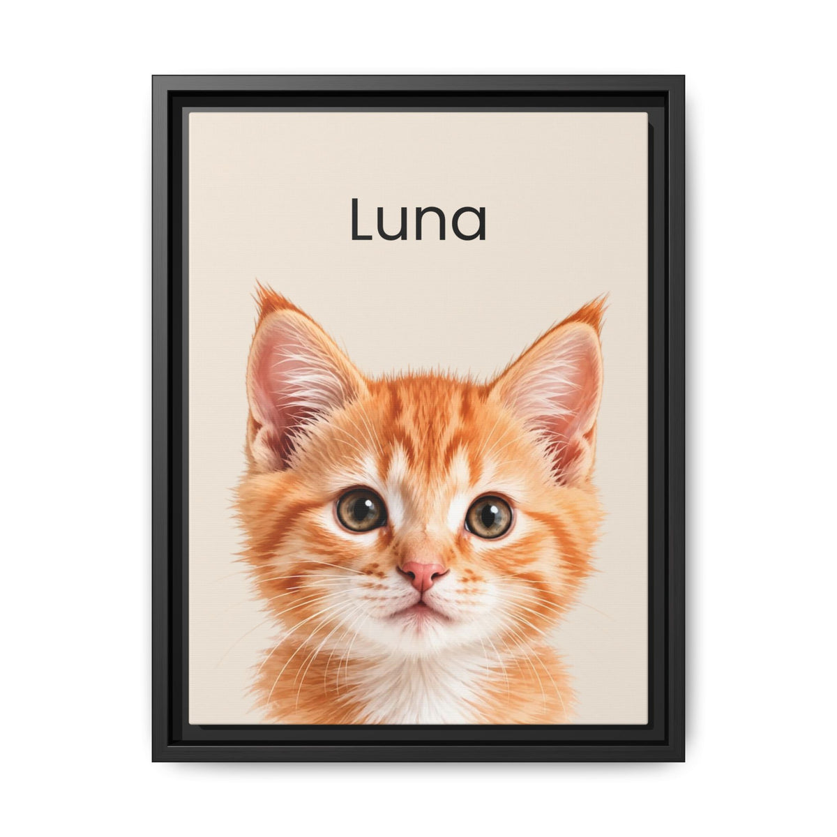 A framed custom pet portrait featuring a close-up photograph of an orange tabby kitten with the name 'Luna' printed above it in a clean black frame against a white background.