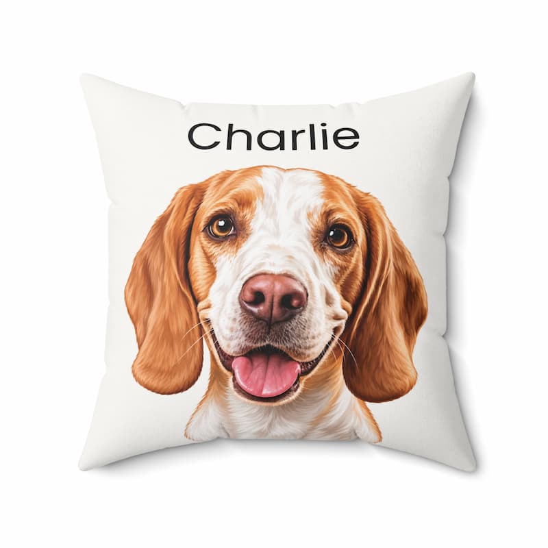 A square white throw pillow featuring a printed portrait of a brown and white beagle dog with the name 'Charlie' printed above it in black text, shown on a clean white background.
